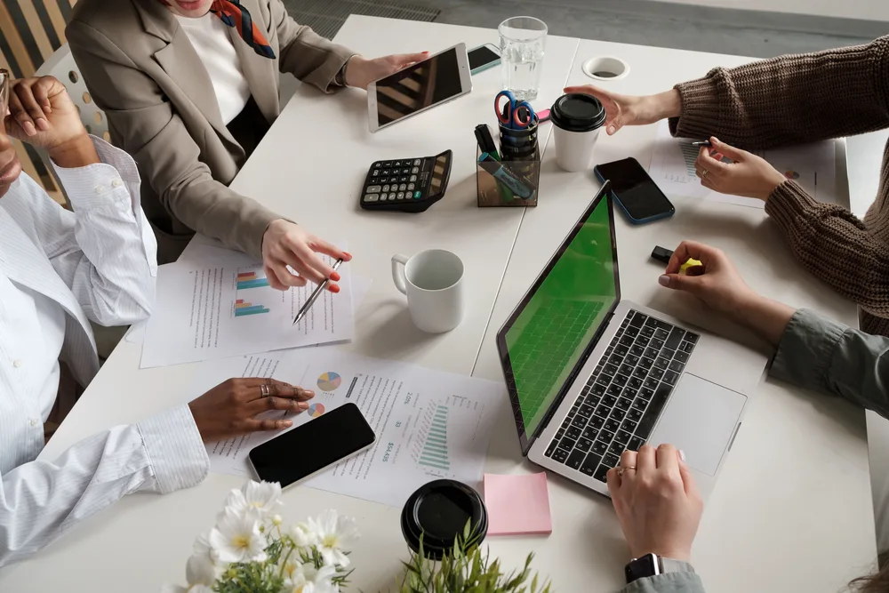 Team collaborating around a table